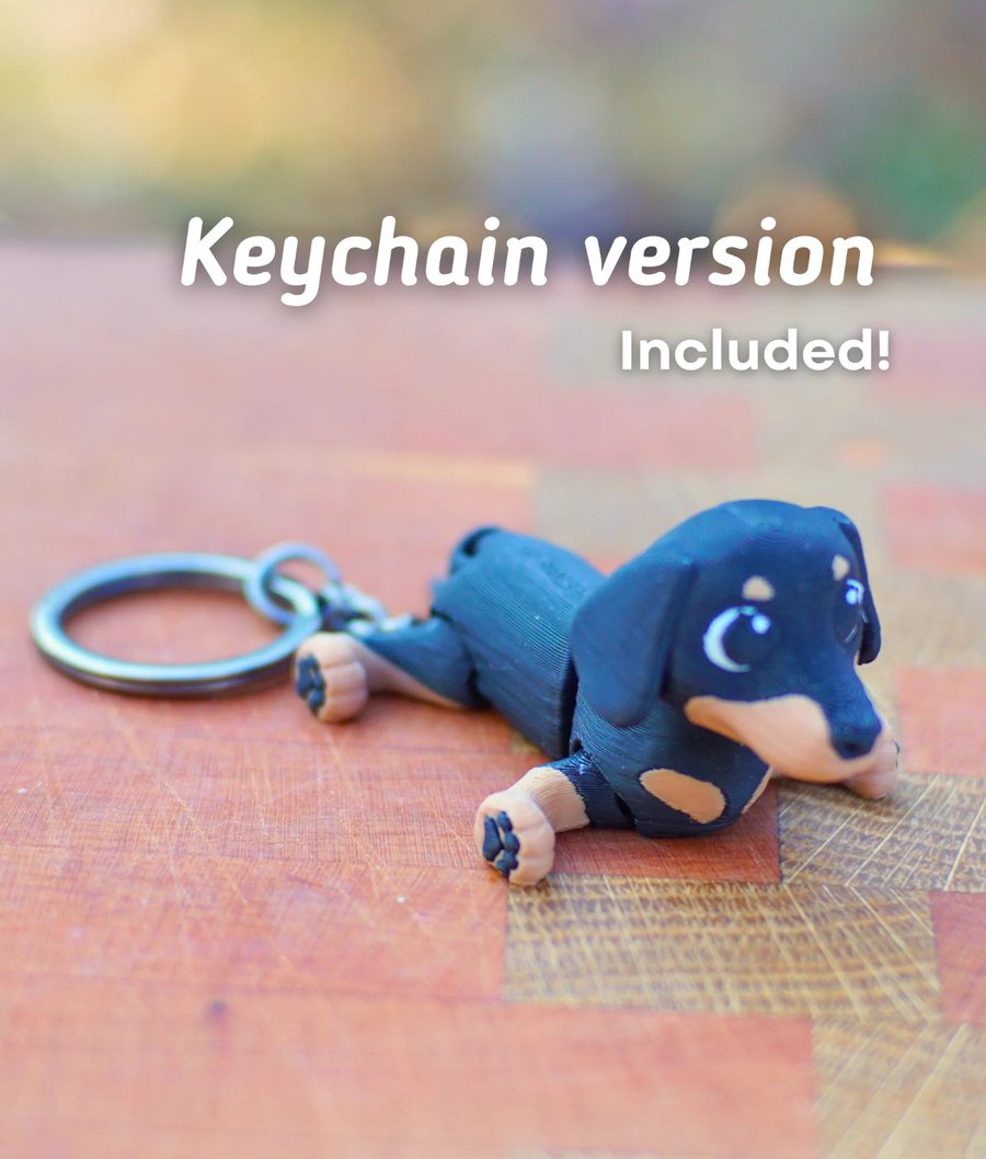 3D printed articulated dachshund dog keychain in black and tan
